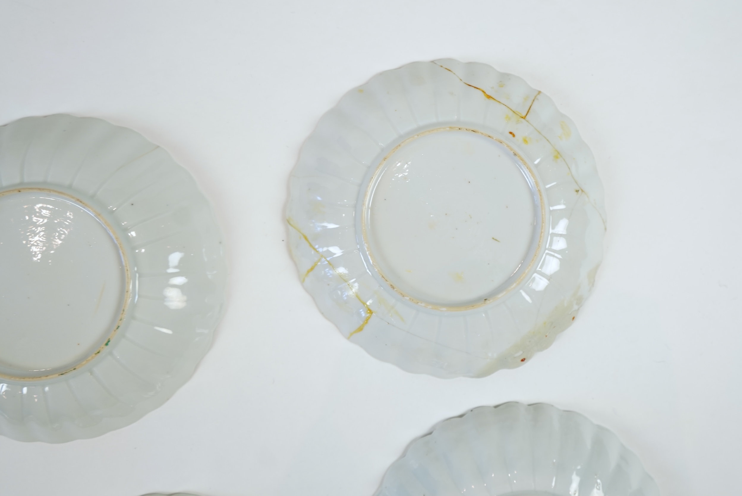 A set of six Chinese famille verte petal lobed saucer dishes, Kangxi period